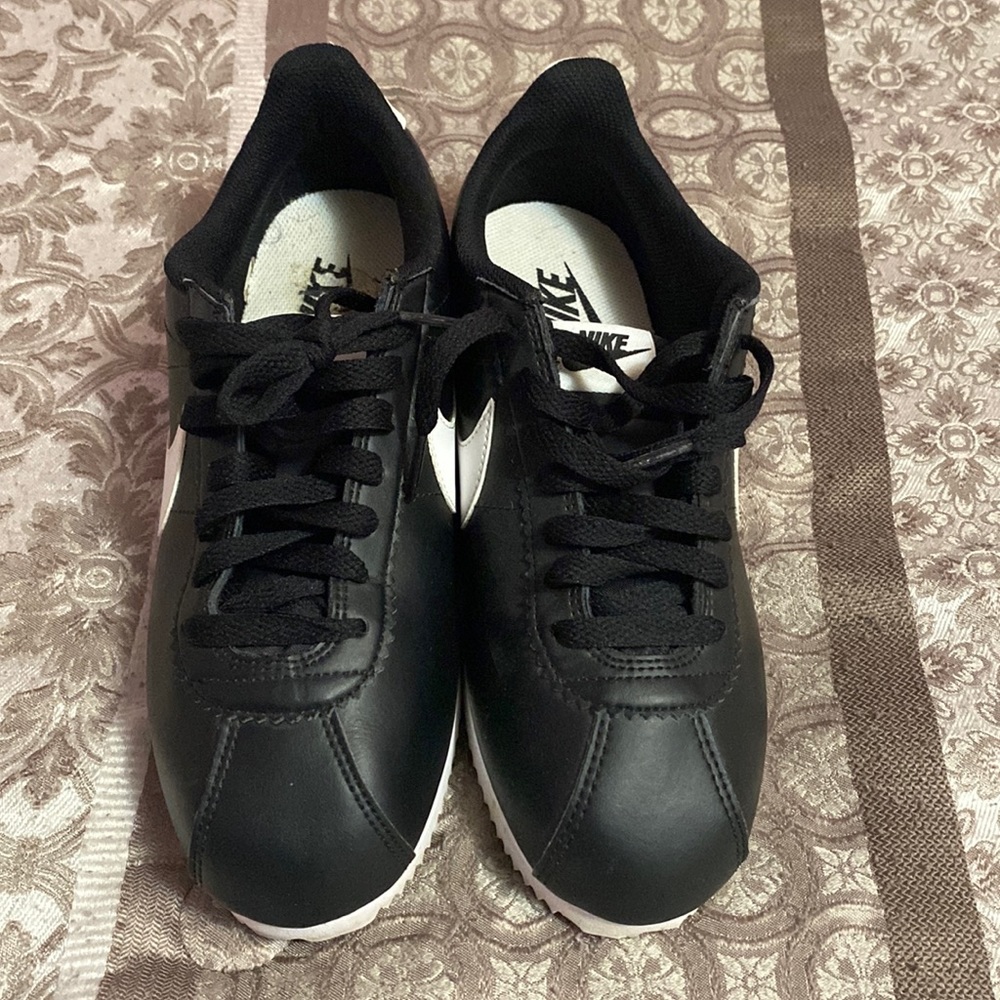 Women’s Black and White Nike Cortez